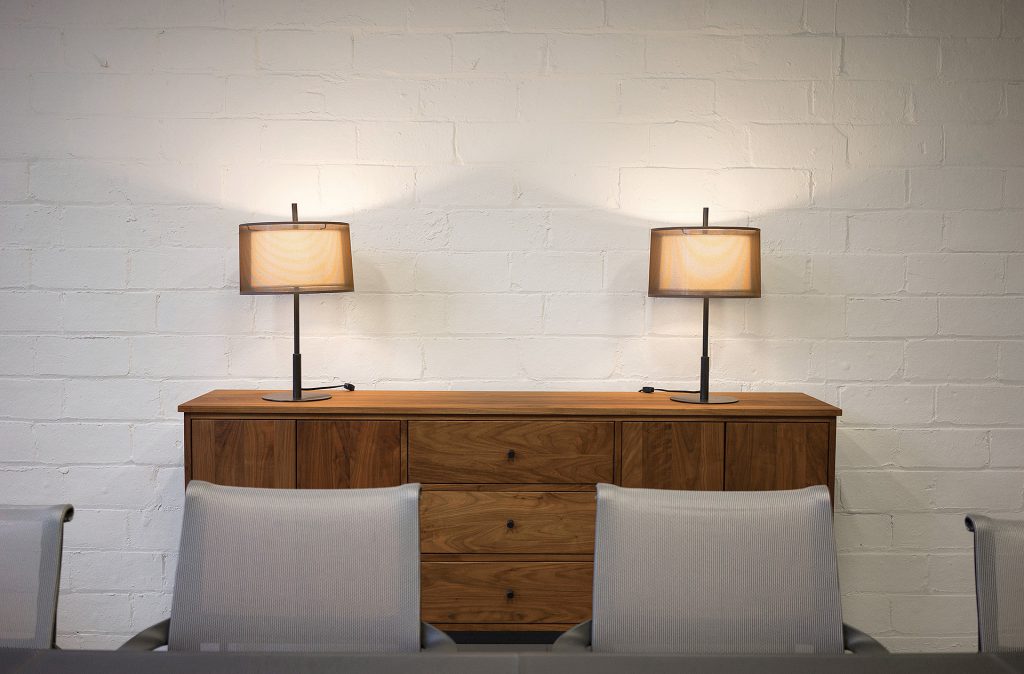 Linear storage piece and Echo Table lamps