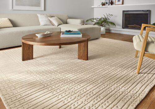 Living room with Bria 8x10 rug and Hanover walnut coffee table.