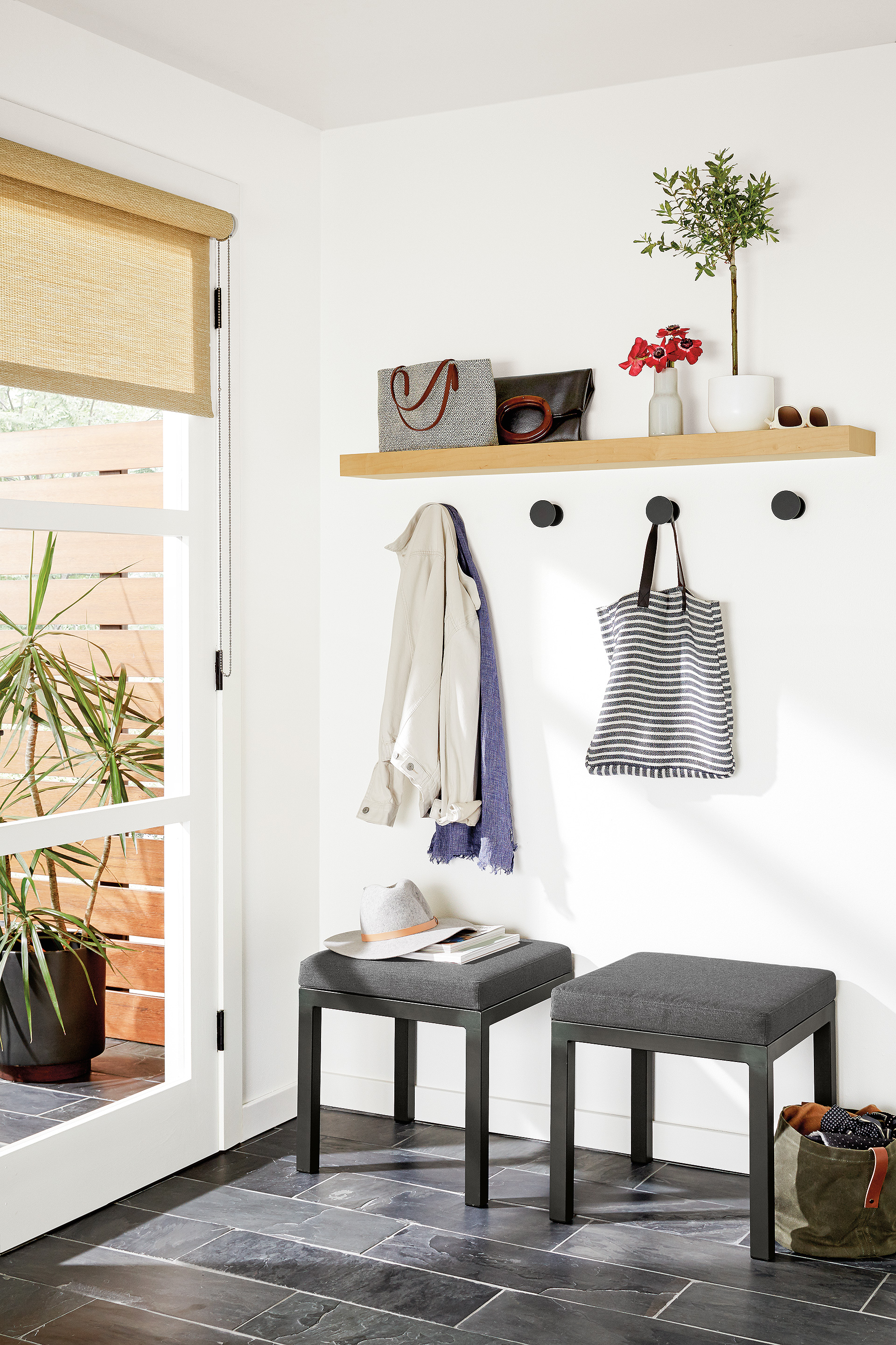 Float shelf in entryway with Compass hooks
