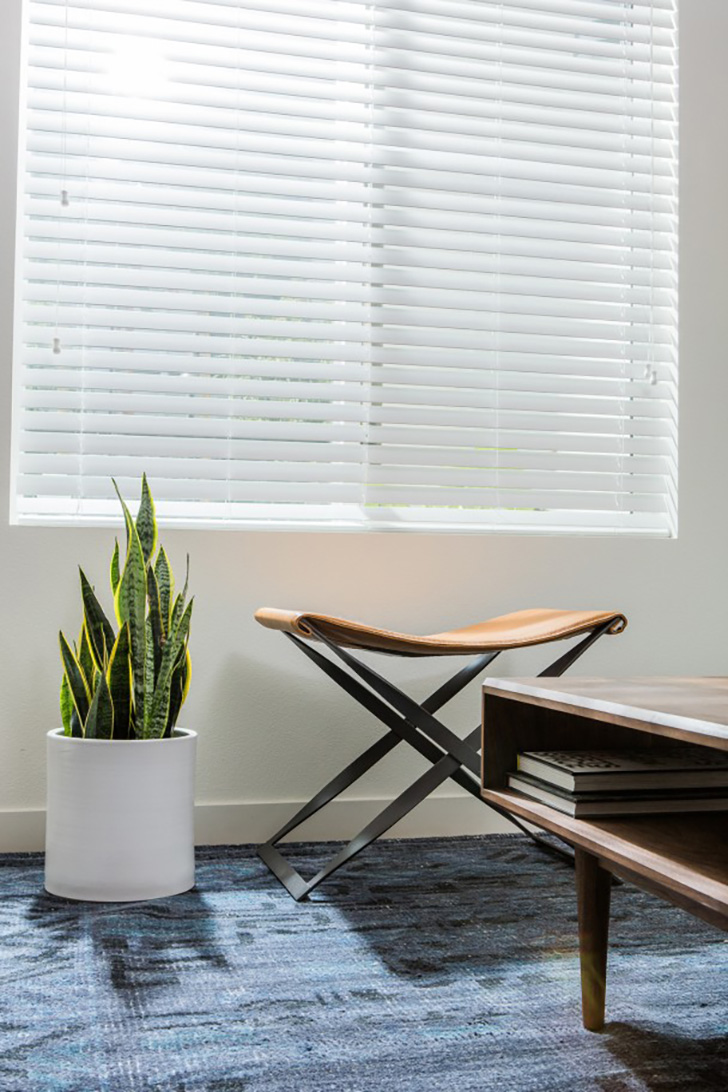 Era Round planter and Karr leather stool in bedroom