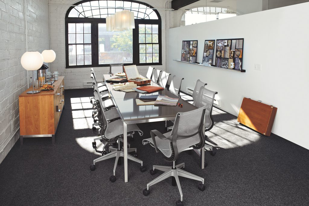 Portica table with armless desk chairs