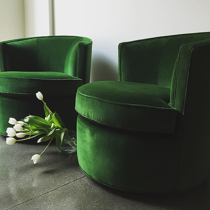 Green Otis swivel chairs in living room