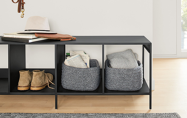 Organized slim cubby bench in entryway