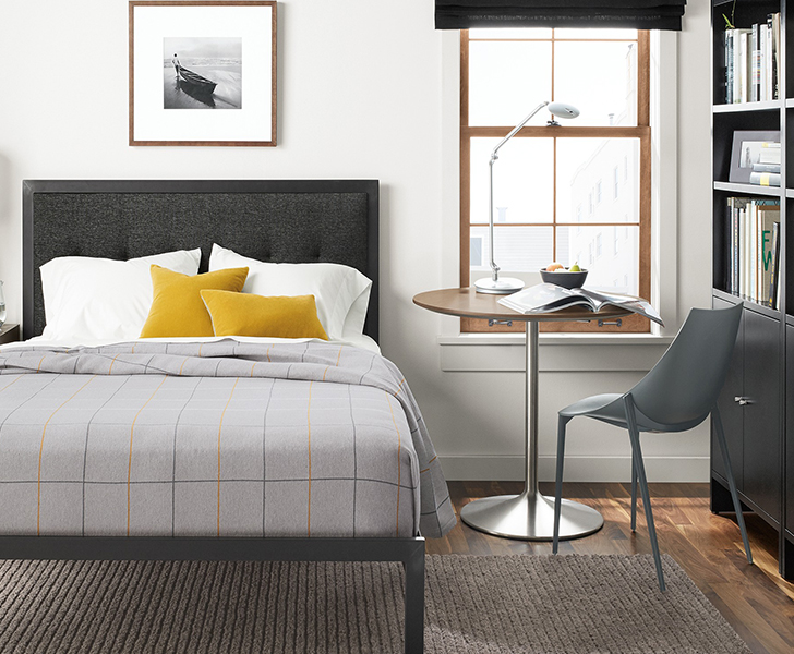 Aria table in bedroom as nightstand and work station