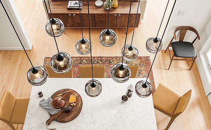 Banded pendants by Hennepin Made in dining room