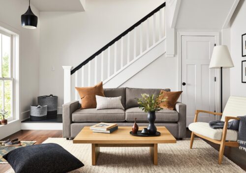 room setting including york 87-wide sofa in dawson cement, callan chair, corbett coffee table, dia rug.