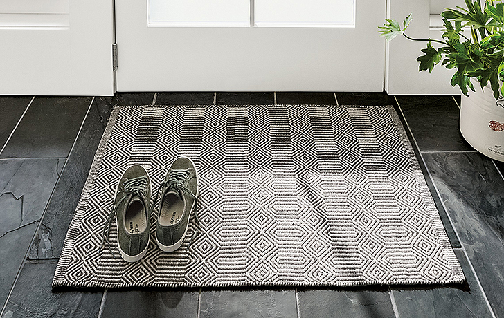 Sequence rug in entryway