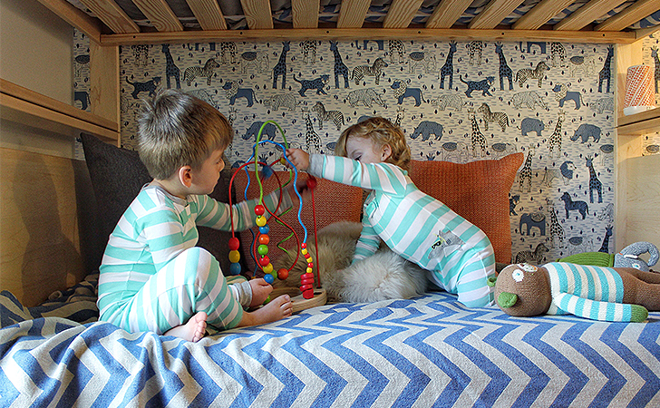 Boys on bunk in small space bedroom