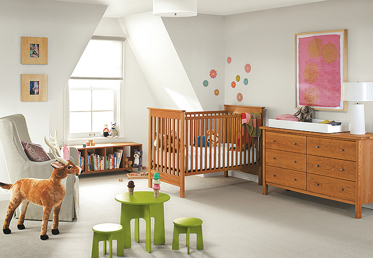 kids storage ideas: babys' room with cherry nest crib and cherry dresser
