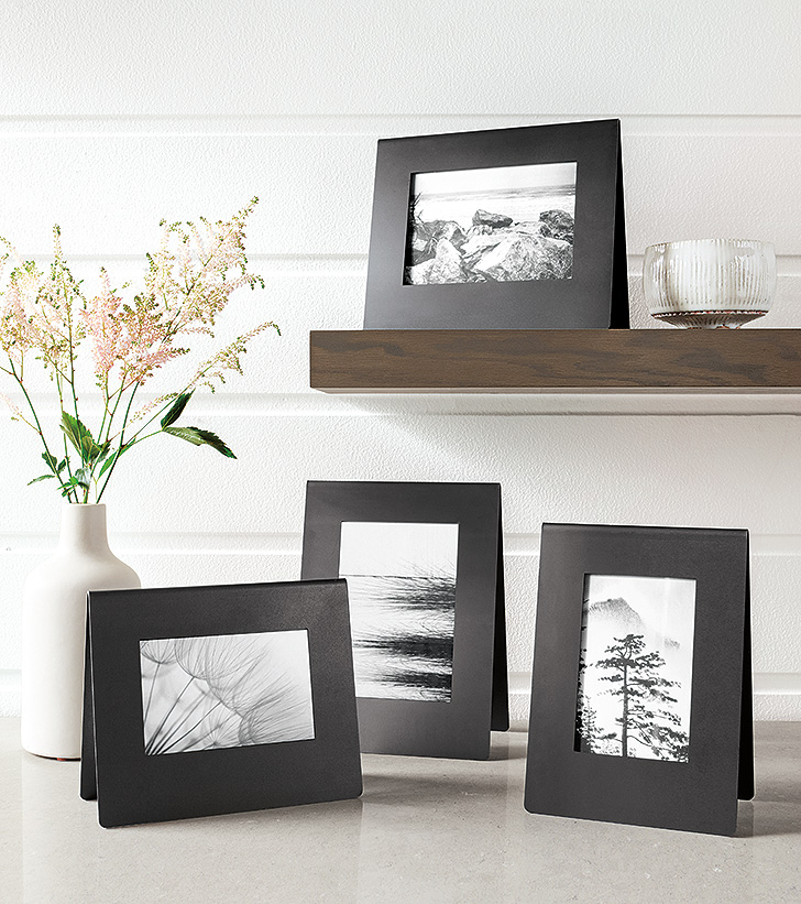 Bend minimal natural steel free-standing picture frames