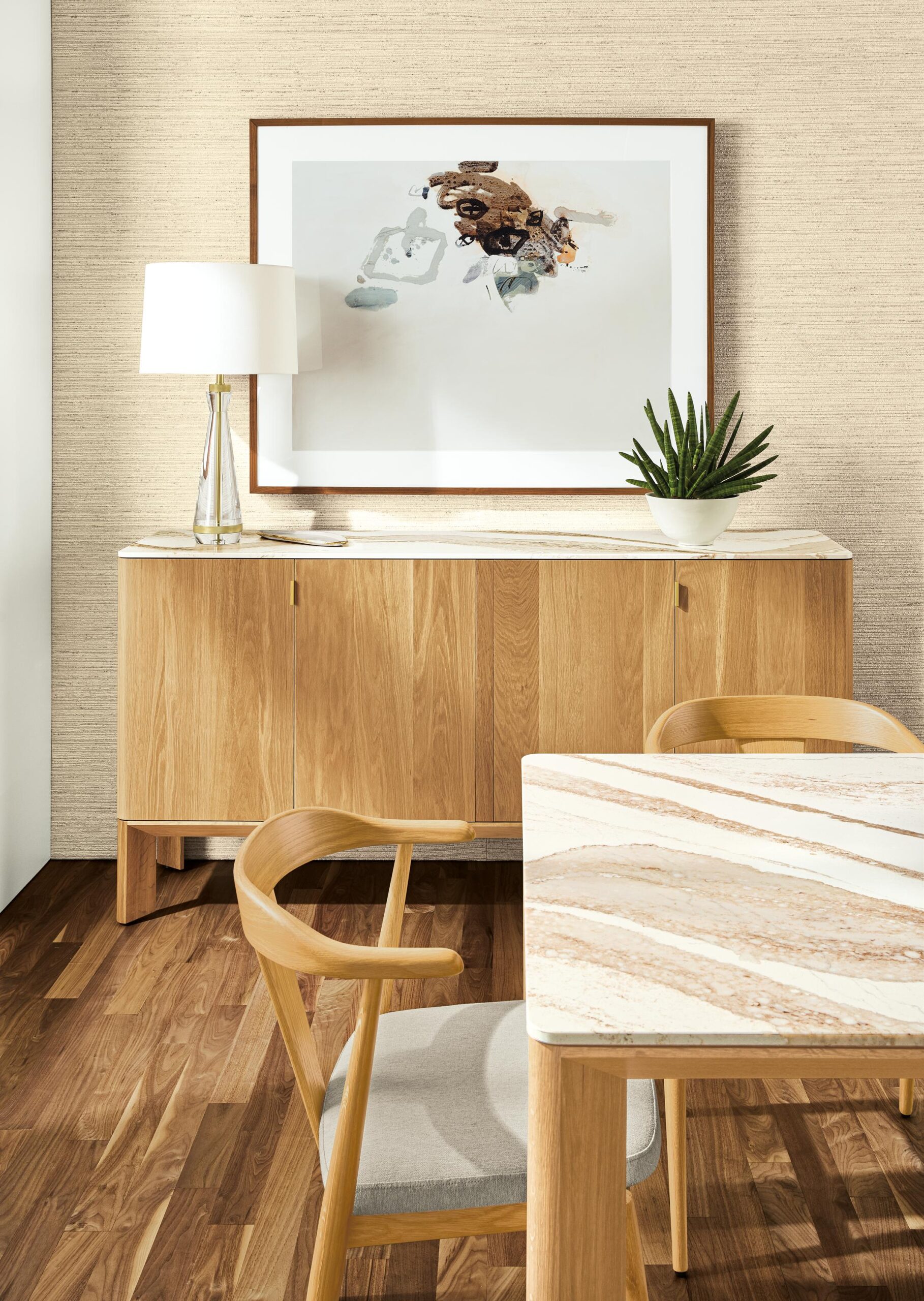 Detail of Pren storage cabinet in white oak with Cambria Brittanica Gold top in conference room.