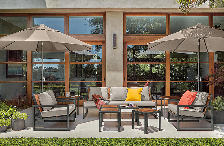 Outdoor lounge space with sofas and chairs