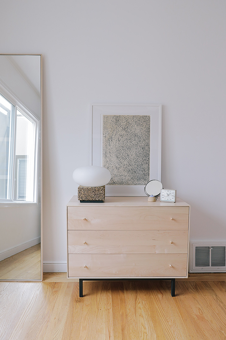 Modern wood dresser in bedroom