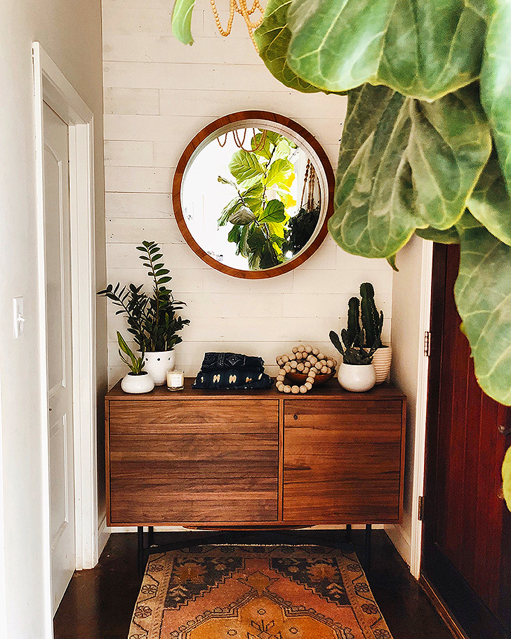 Modern wood storage cabinet in small space entryway