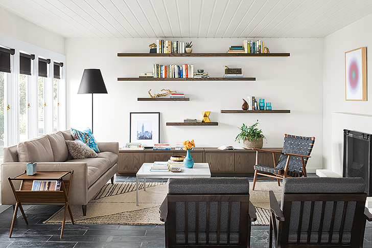 Wall shelves and ledges filling an entire wall in a modern living room