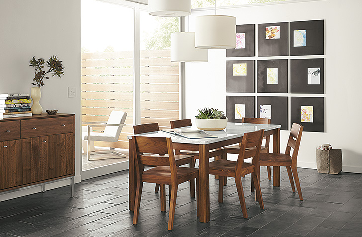 Large modern gallery wall with Manhattan photo frames in dining room