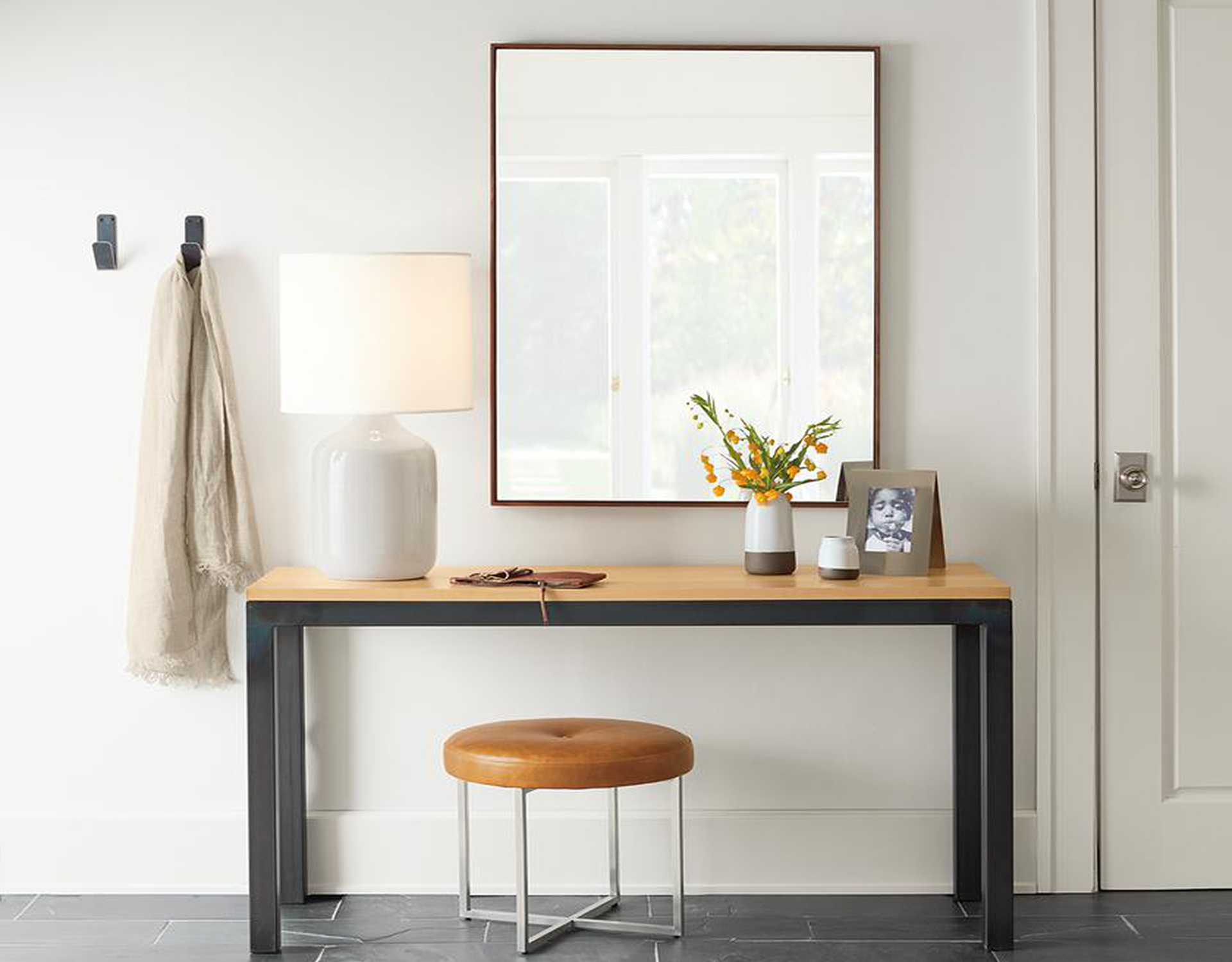 Entryway with table and stool