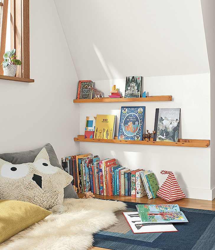 Reclaimed wood picture ledges in modern kids' bedroom