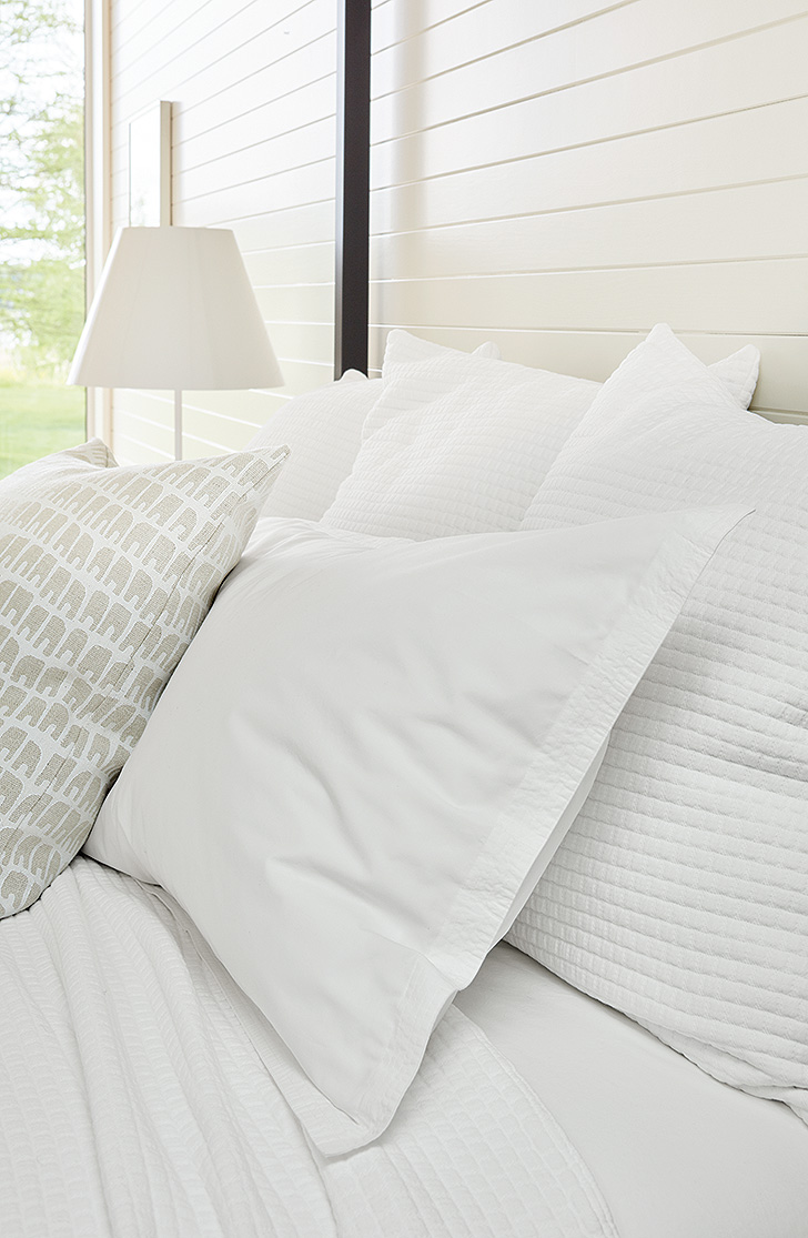 close up of modern white textured bedding