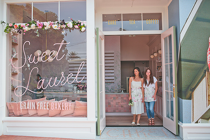 Claire and Laurel standing in front of Sweet Laurel Bakery entrance