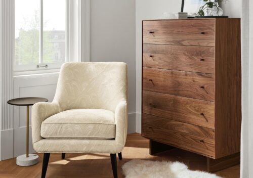 Detail image of quinn chair in Noloni Ivory and Hudson dresser in walnut.