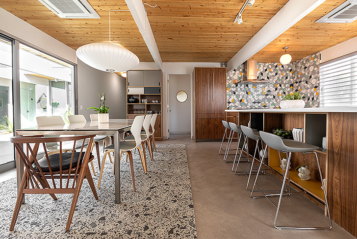 Dining room and kitchen inside the Desert Eichler