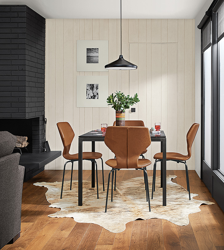 Cowhide rug defines small dining zones