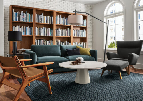 living room setting with clemens sofa, boden chair, lars chair, decker coffee table.