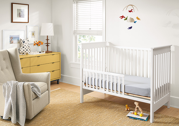 Baby room nursery with yellow accents