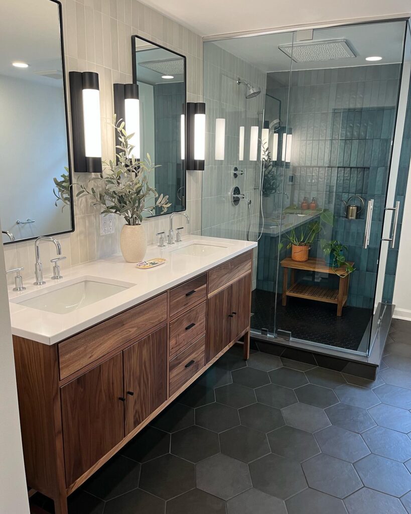 Modern bathroom with a double sink vanity in dark wood.