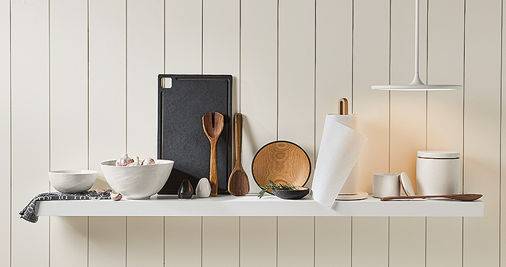 white shelf with kitchen accessories